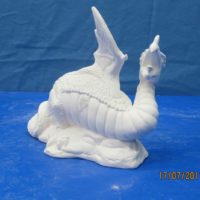 doc holiday 1189 baby dragon couching (SP 180)  9"L  bisqueware