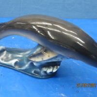 large whale out of water bisqueware