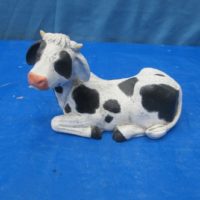 scioto 1349: lying cow eyes closed(CO13)  bisqueware