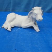 scioto 2348: cow lying looking right  bisqueware