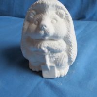 gare 3041 boy hedgehog w/shovel (HD 6) 6"H bisqueware