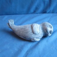 gare 2340 seal pup lying  (FR88)  8"L  bisqueware