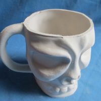 large skull mug  bisqueware
