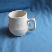 pat cup   bisqueware